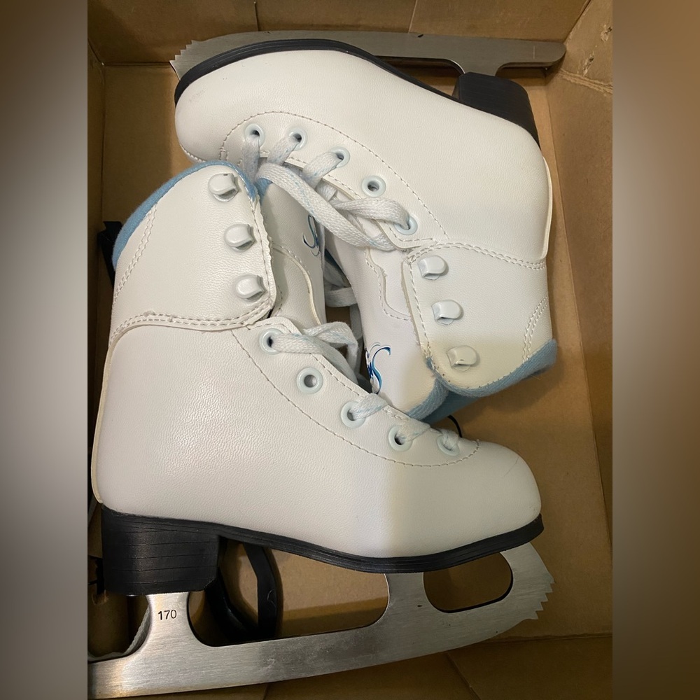 Little girls ice skates
